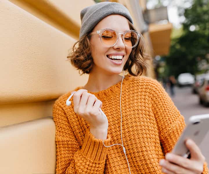 woman with orange sweater